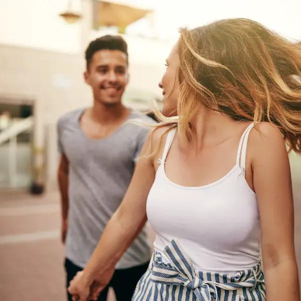 Boyfriend and girlfriend holding hands