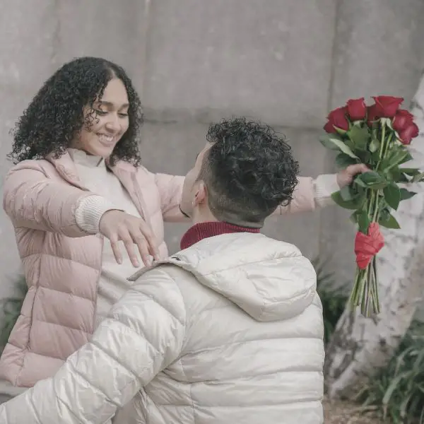 Boyfriend giving girlfriend roses