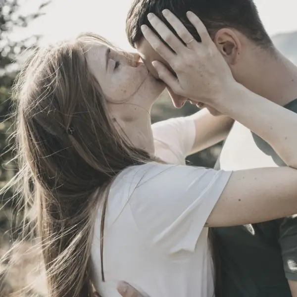 Girlfriend kissing her boyfriend