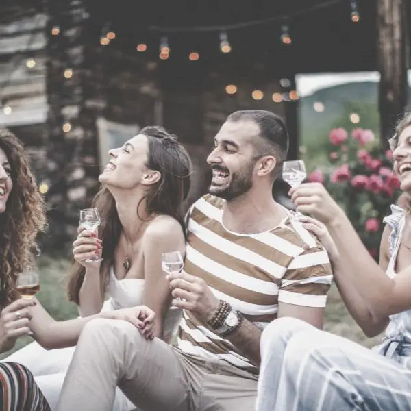 Short guy hanging with women