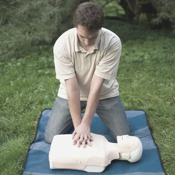 man learning CPR