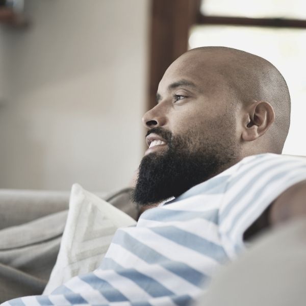 Guy happy and relaxing alone