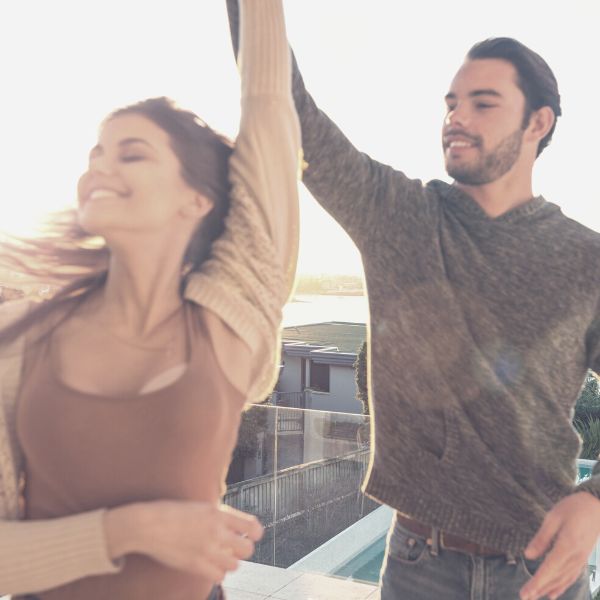 Man ans woman dancing and having fun