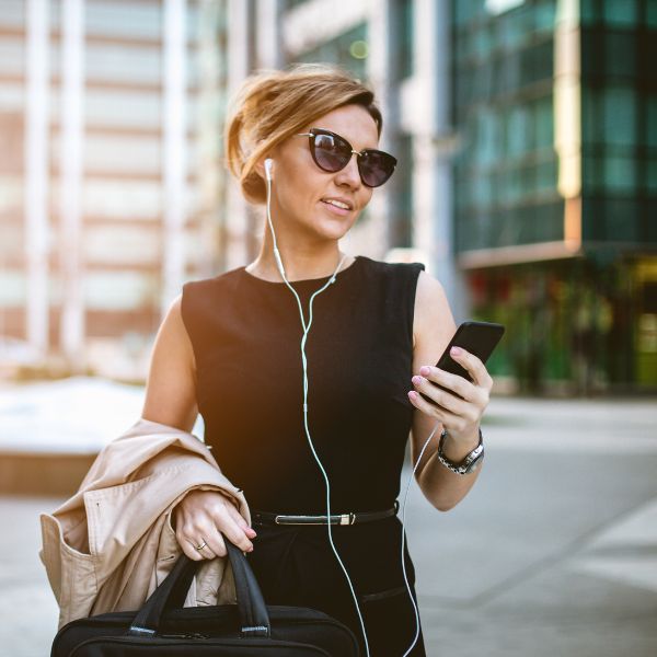 Busy woman reading a text message